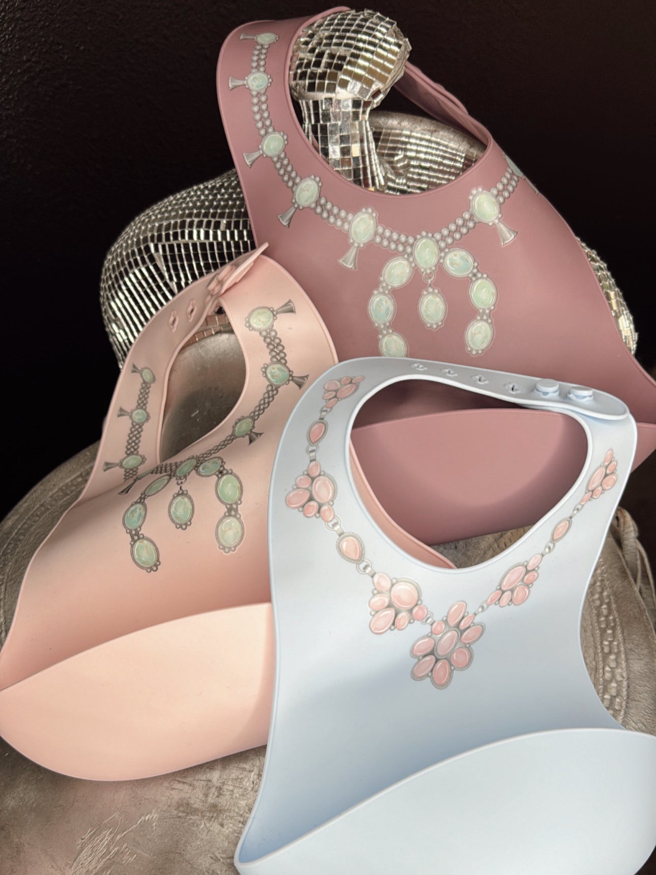 The Turquoise Squash Silicone Bib in Purple