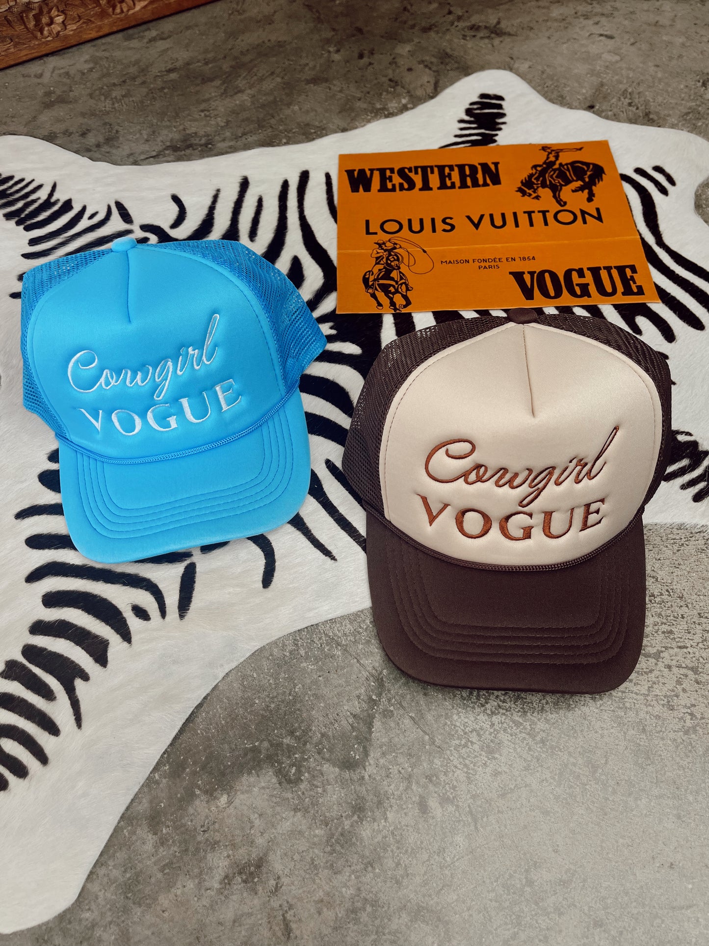 The Cowgirl Vogue Trucker Hat in Blue