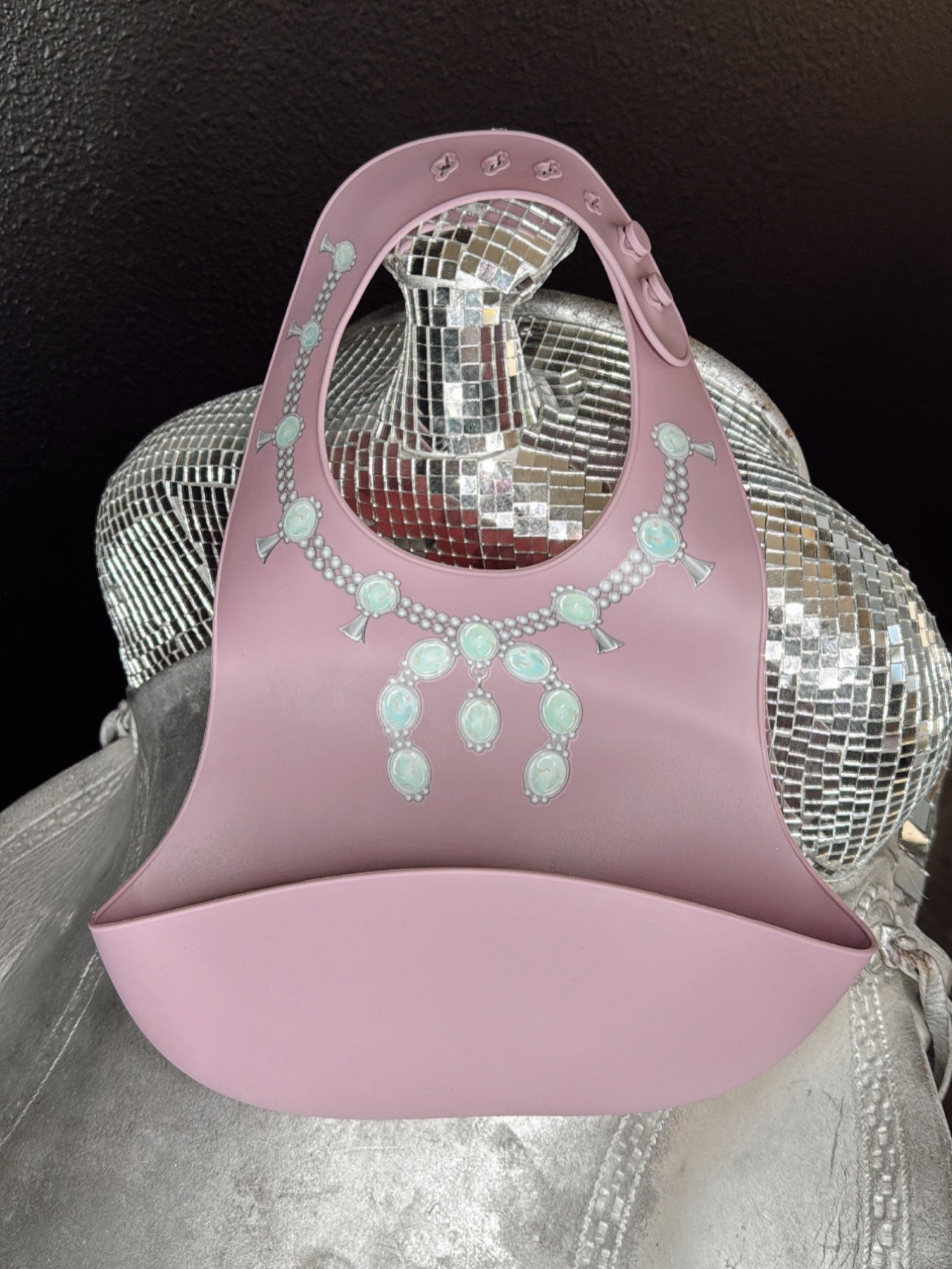 The Turquoise Squash Silicone Bib in Purple