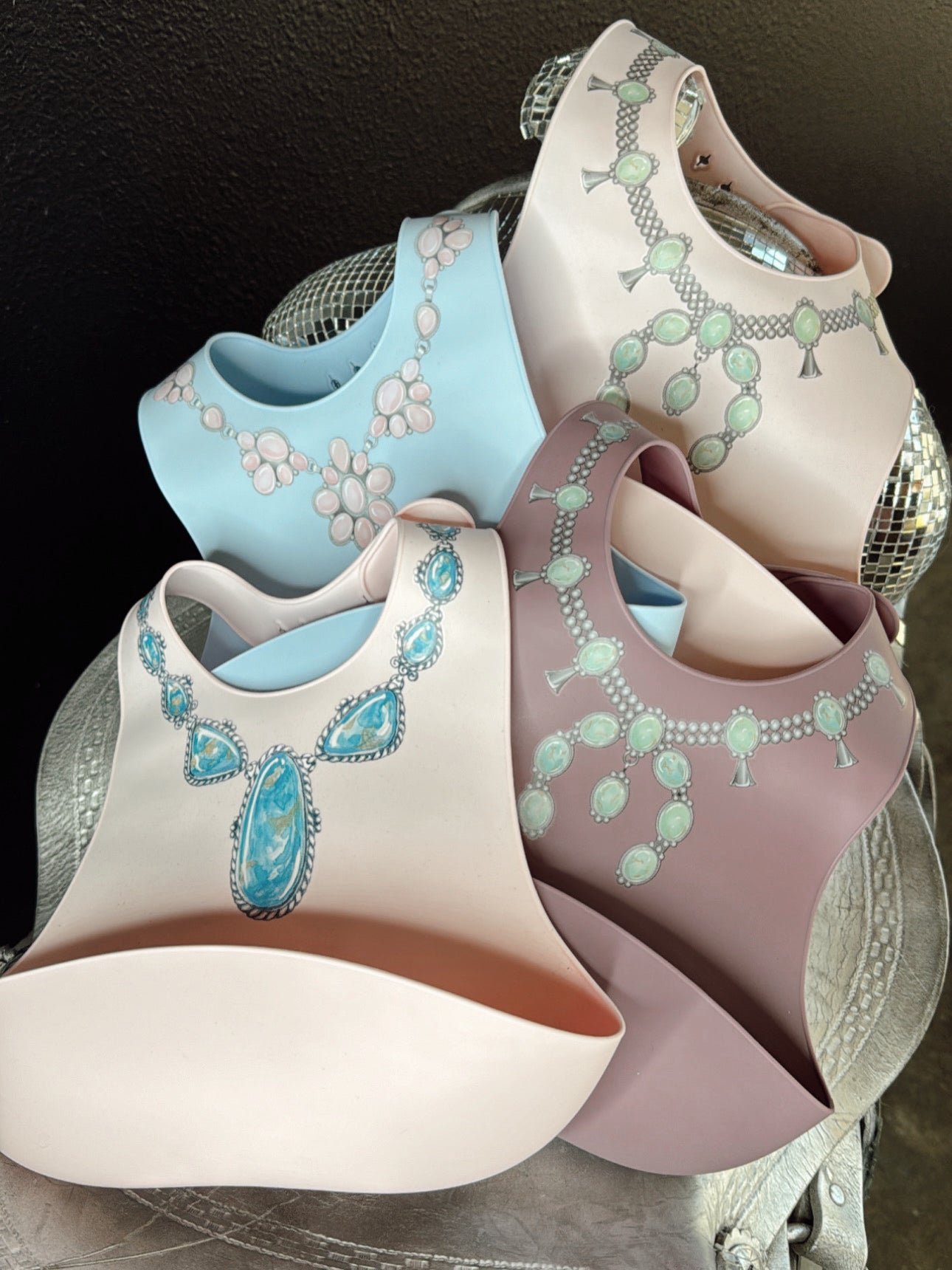 The Turquoise Squash Silicone Bib in Purple