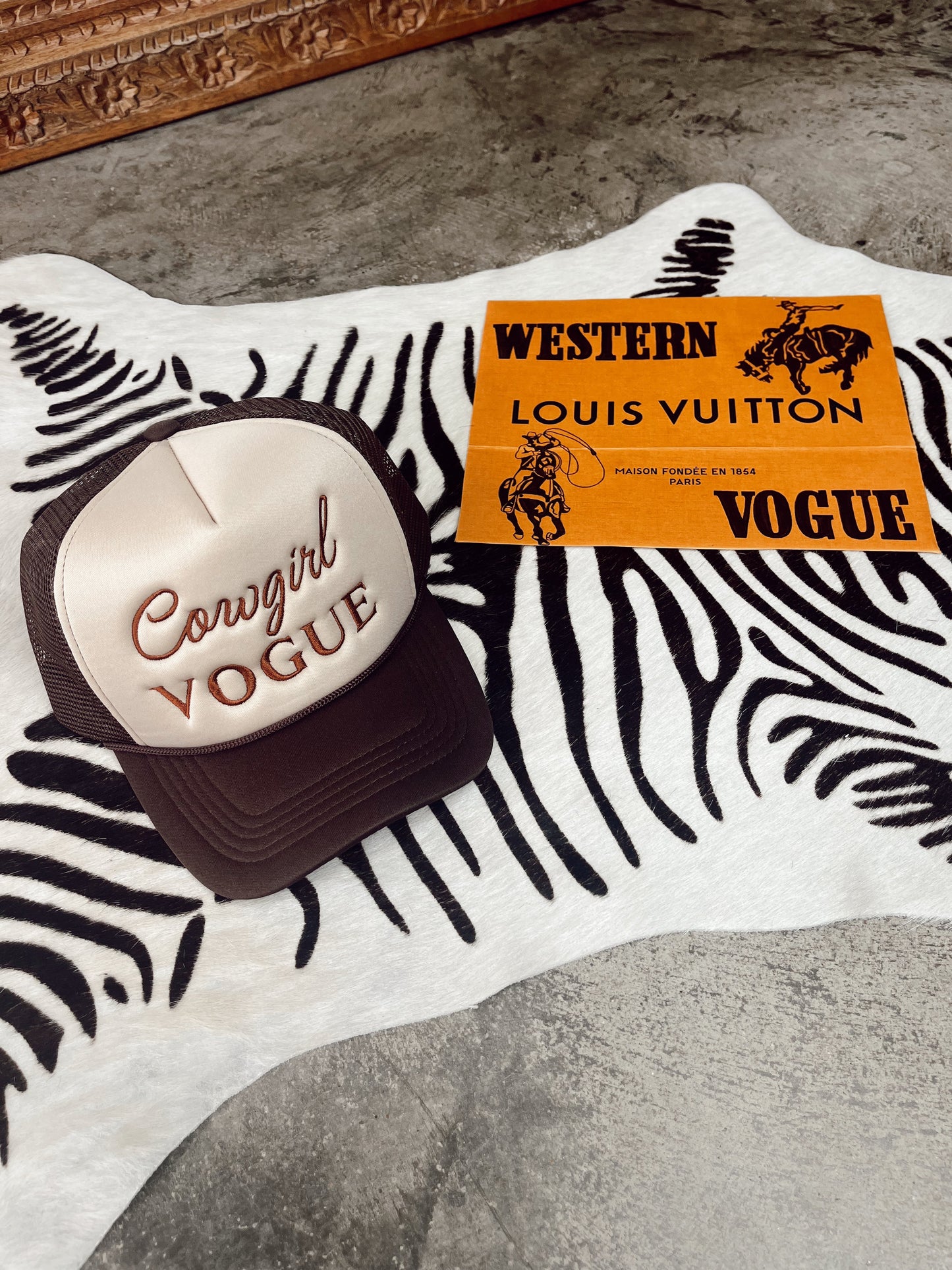 The Cowgirl Vogue Trucker Hat in Brown