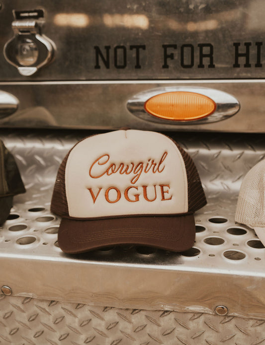 The Cowgirl Vogue Trucker Hat in Brown
