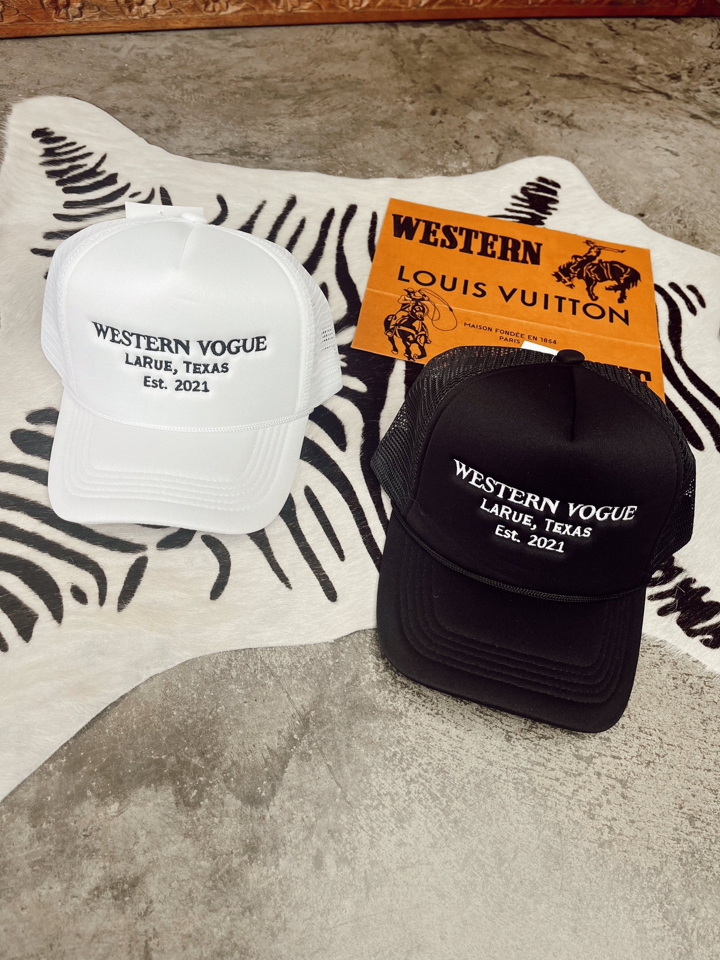 The EST. 2021 Western Vogue Trucker Hat in White