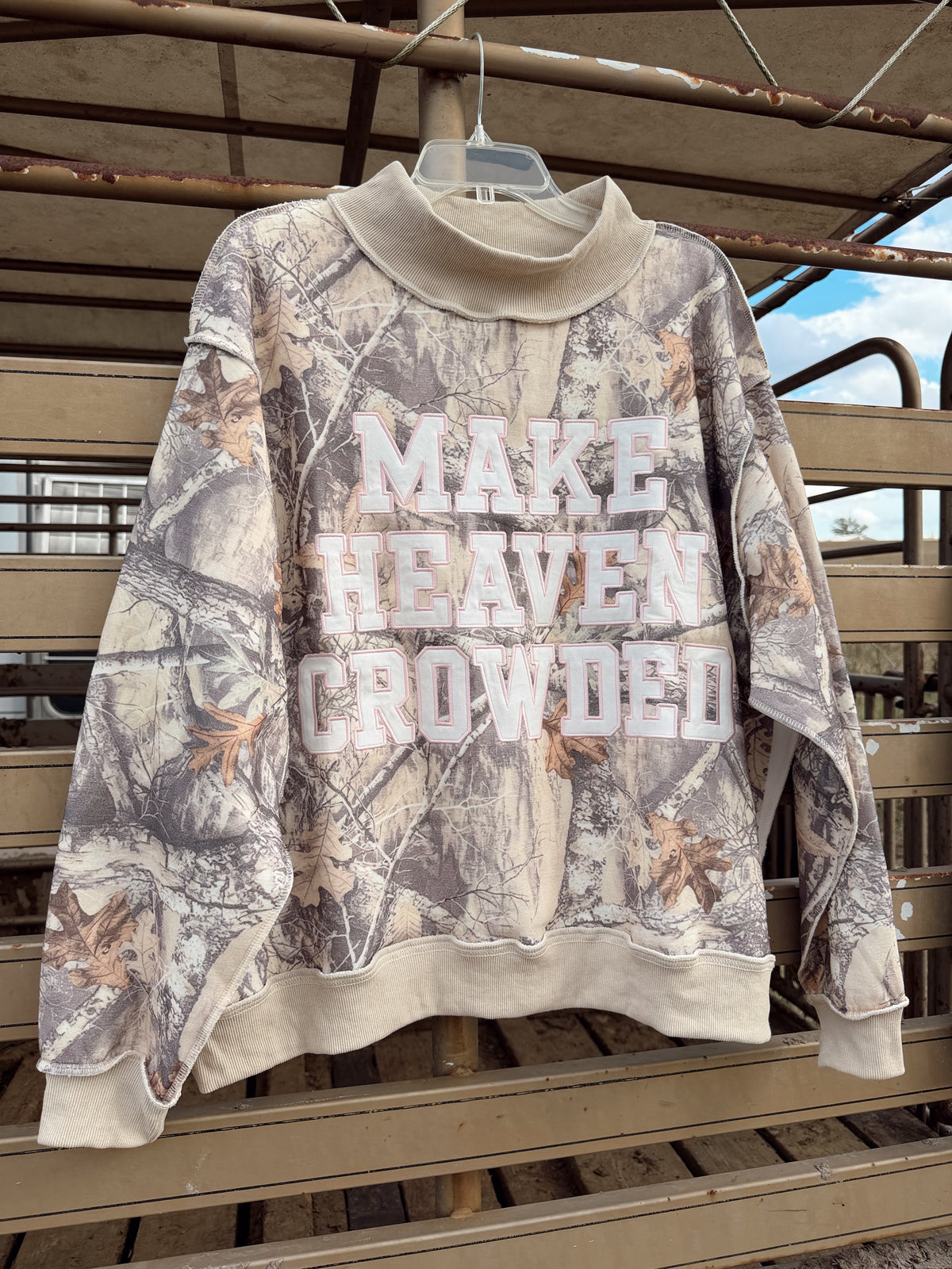 The Make Heaven Crowded Mock Neck Sweatshirt
